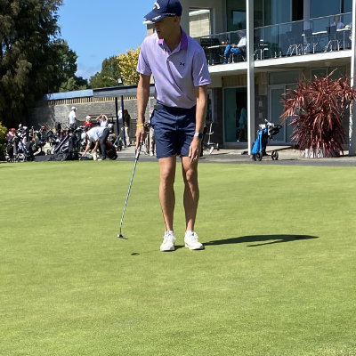 Golfer practicing putting at Royal Hobart Holf Course